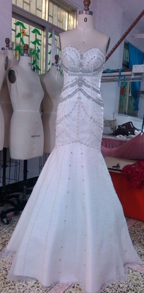 Fitted strapless evening gown for a Wedding by Darius Cordell