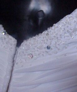 zipped white embroidered wedding gown