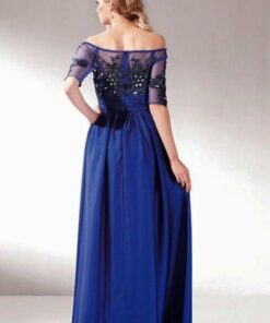 Blue embroidered evening dress by Darius Cordell