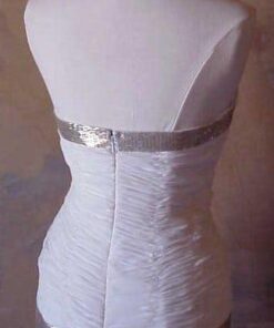 Back of white and golden wedding gown