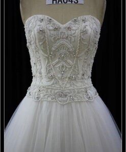 Darius Cordell close intricate beaded wedding gown