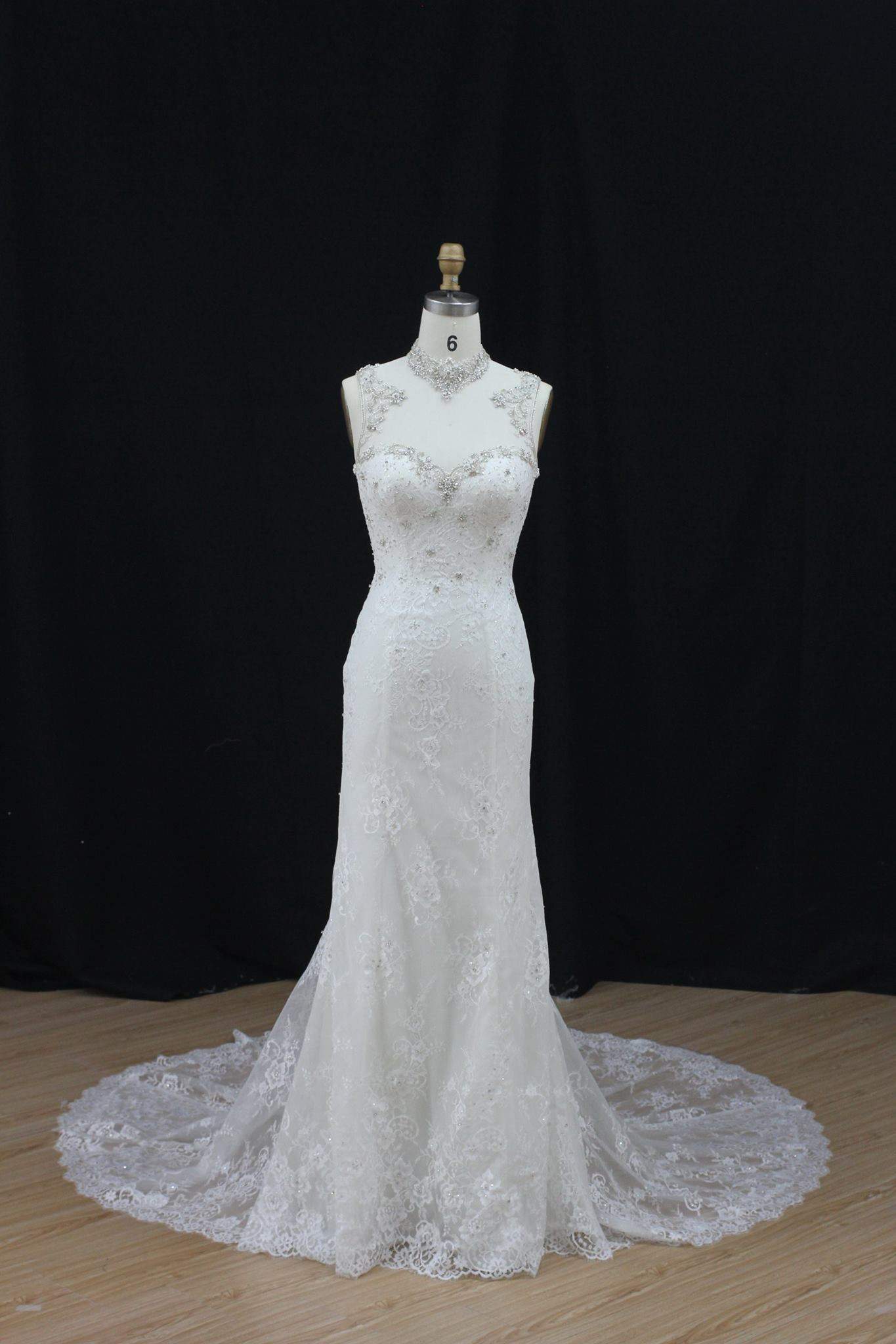 Beaded illusion neckline bridal dresses from Darius Couture