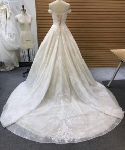 Style off the shoudler lace up back wedding gown from darius Cordell