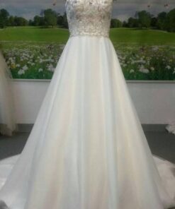 Style#FA IMPA linebeadedbridalgownwithacapsleevefromDariusCordellCoutureFashionDesigns