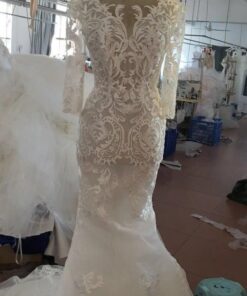 Style#JinCouturelongsleeveembroideredweddingdressbyDariusBridal