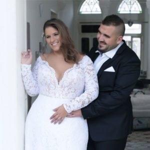 v-neck plus size wedding gown with lace sleeves