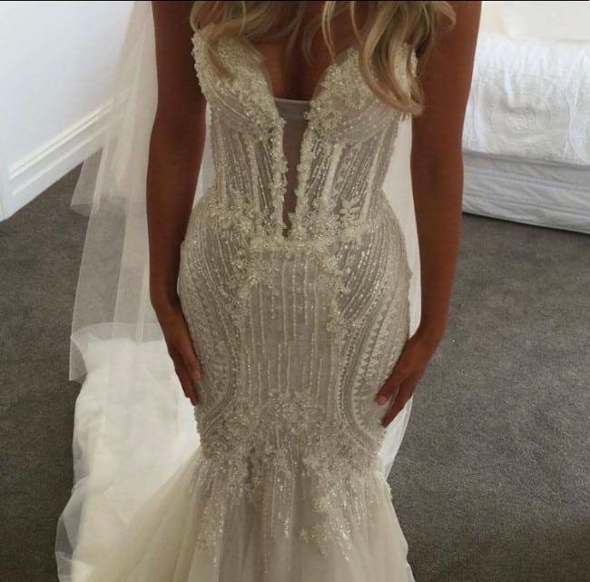 Delicately beaded couture wedding dress with fit-n-flare cut