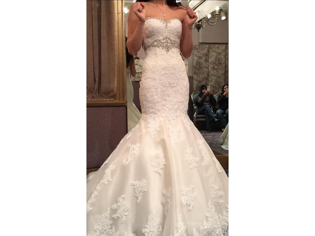 a fit-n-flare strapless wedding dress with beaded lace and crystals