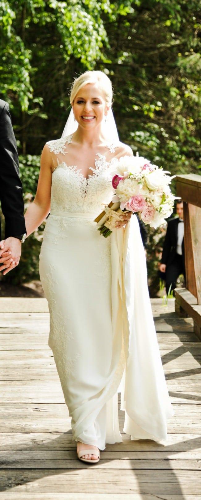 sheer illusion neckline wedding gown with delicate lace