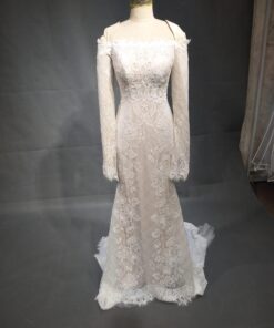 Elainne replica of a ester couture long sleeve lace wedding gown by Darius Cordell