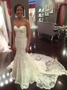 Pretty strapless lace wedding gown with train from Darius Bridal