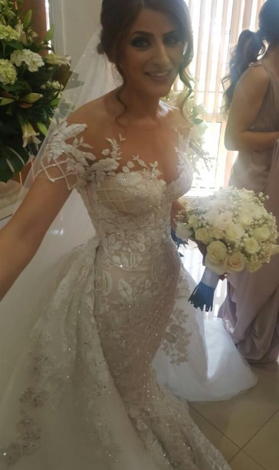 Couture bridal gown with off the shoulder neckline from Darius Collection