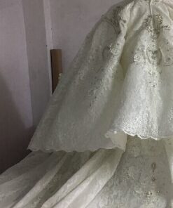 Style #13820 Teired train options from Darius Bridal