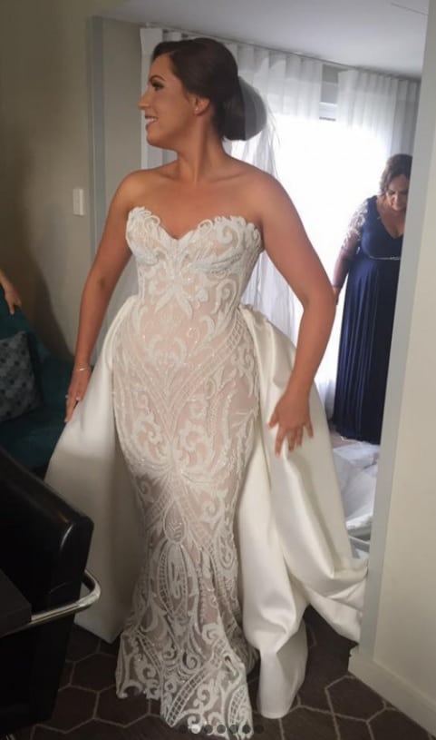 strapless beaded bridal dress with large satin overskirt from Darius Couture