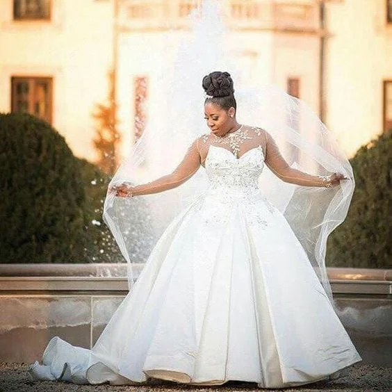 3 Plus Size Wedding Dresses with Sleeves - Strut Bridal Salon