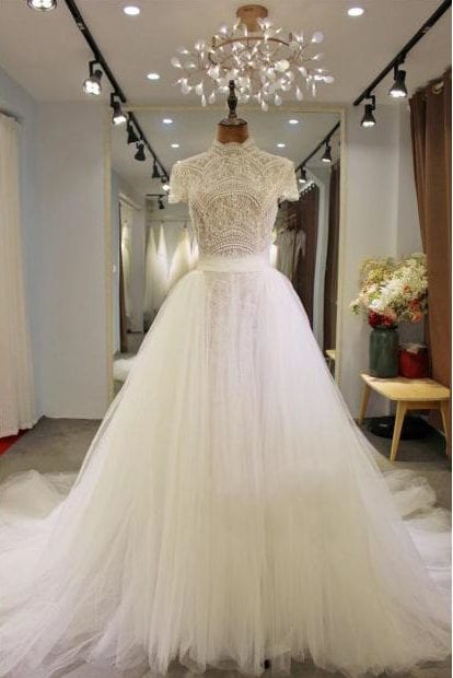 Modest short sleeve ball gown wedding dress from The Darius Collection