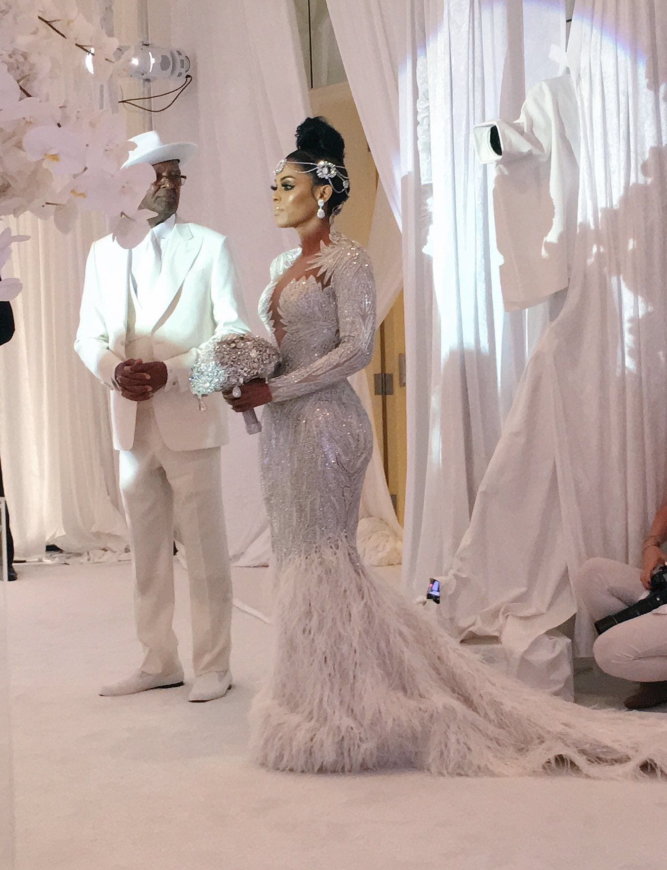 766405 - Beaded long sleeve wedding dress with feathers