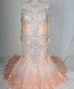 Long sleeve pastel blush plus size wedding gown