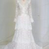 long sleeve tiered lace wedding gown by darius cordell