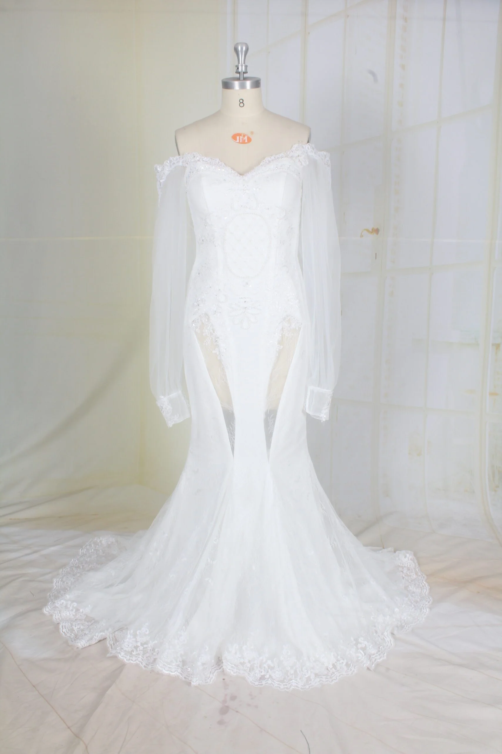 Amanda off the shoulder long sleeve sheer panel wedding gown by Darius Cordell