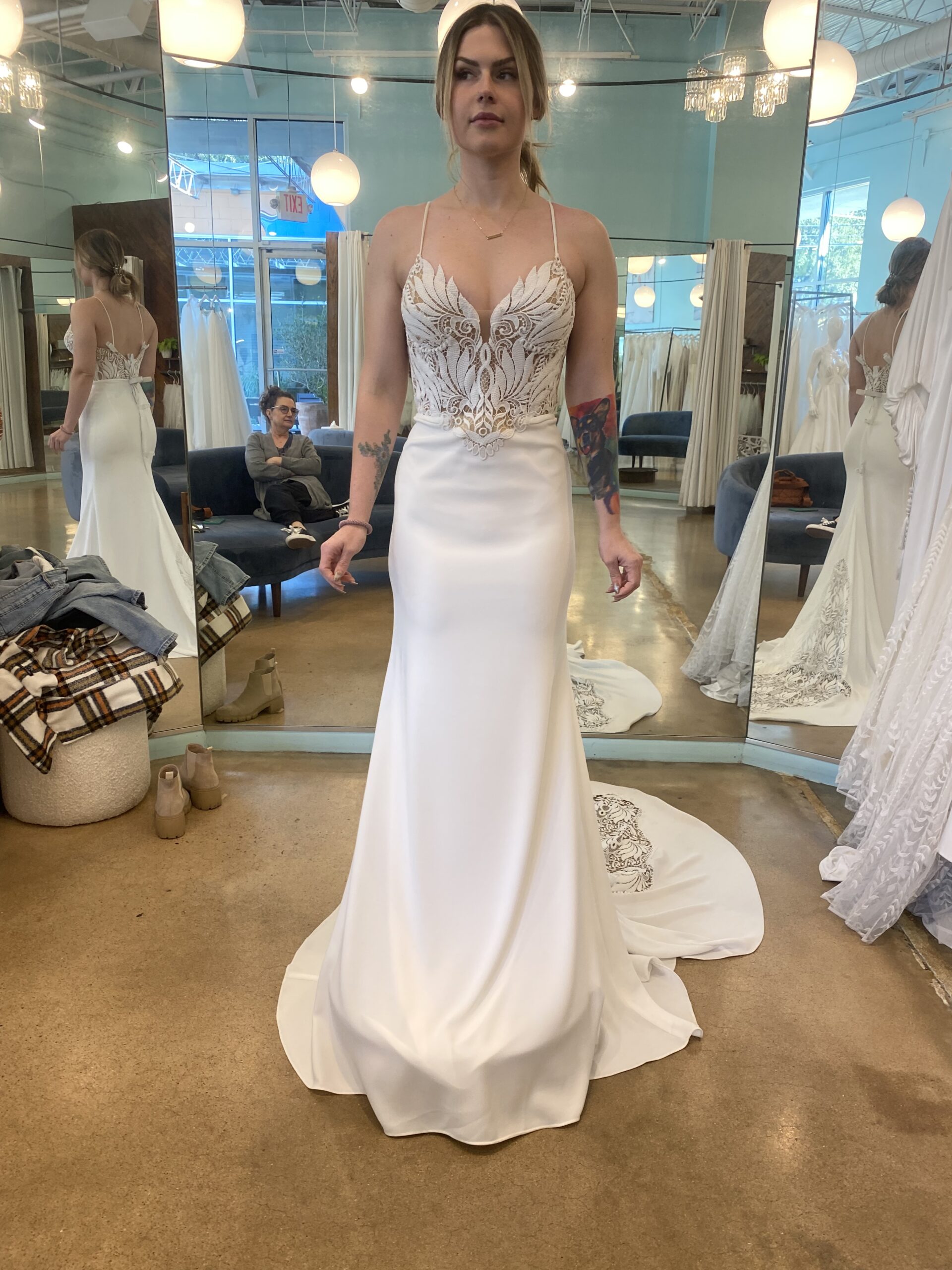 Fitted spaghetti strap wedding gown in white with embroidered bodice