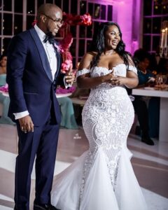 beaded fit-and-flare plus size wedding gown with arm straps