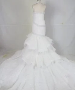 Vintea Burns-2 Darius Cordell haler wedding gown with tiered feather train