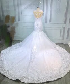 ED001 lace up back embroidered wedding gown with cathedral train by darius cordell